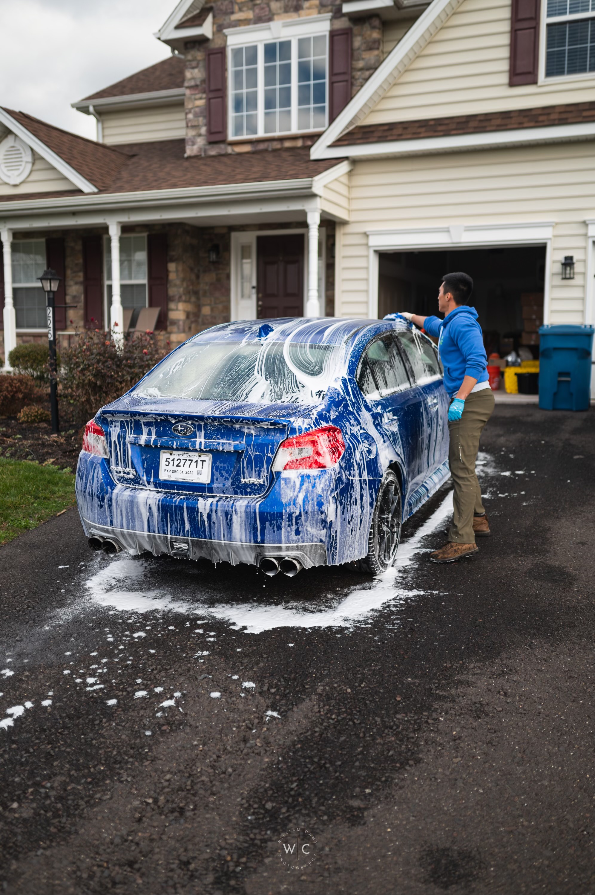 Guy cleaning car